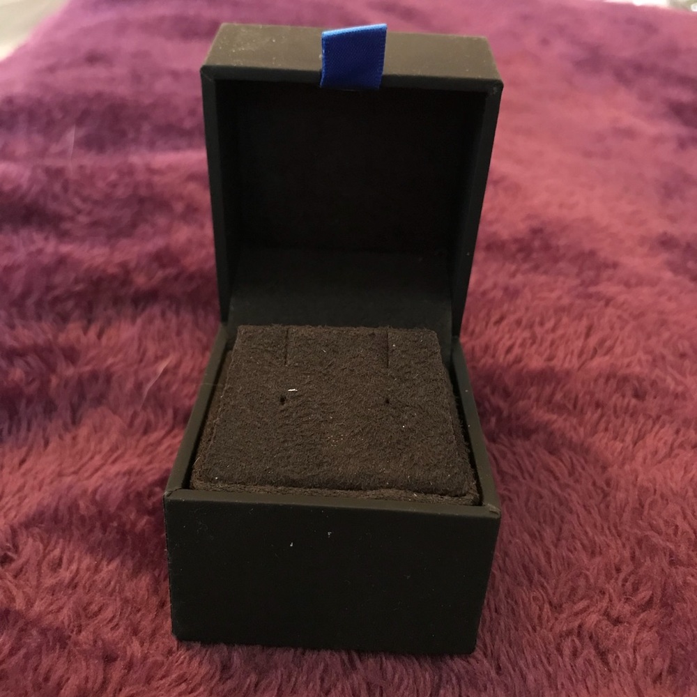 Black jewelry gift box with blue open tab